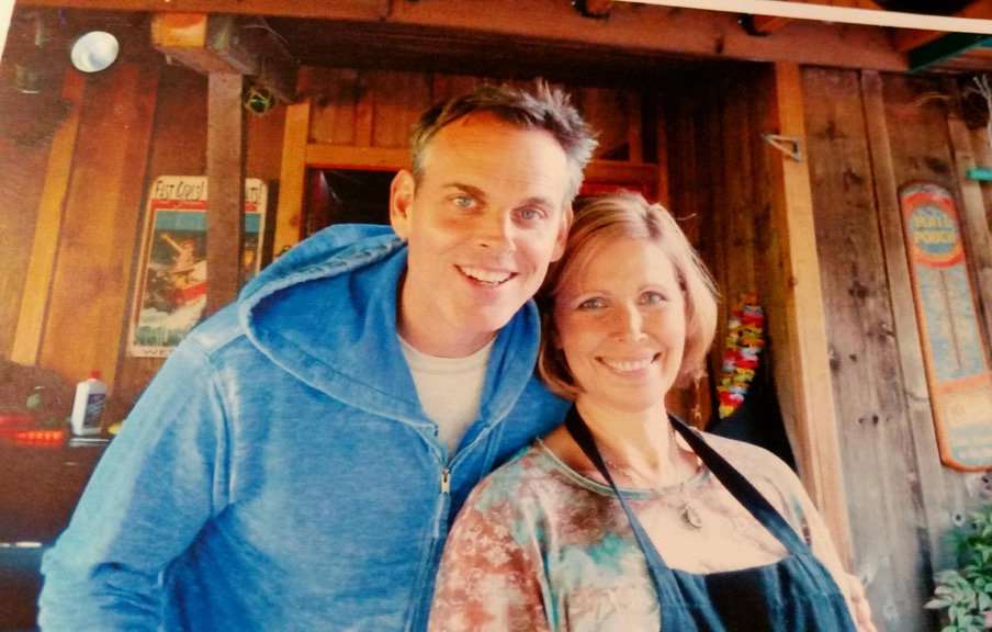 Image of renowned journalist, Colin Cowherd and his sister