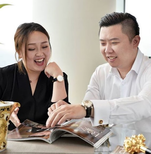 Image of businessman, Dan Lok and his wife, Jennie Li.