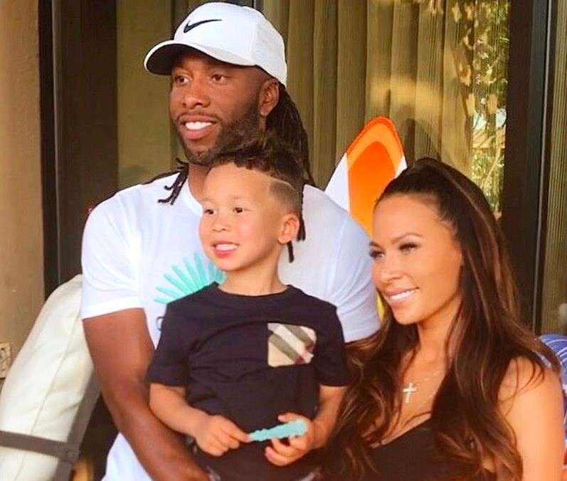 Image of professional footballer, Larry Fitzgerald with his ex-girlfriend, Melissa Blakesleyand son 