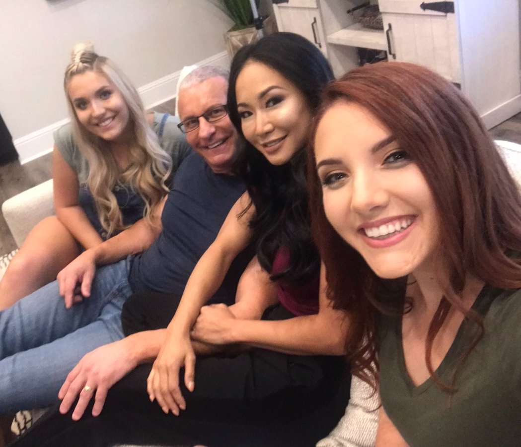 Image of world-class chef, Robert Irvine with his wife and daughters