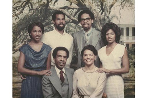 Image of African American activist, Cornel West and his family