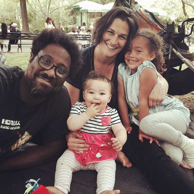 Image of American comedian, W. Kamau Bell, wife, Melissa and their two daughters