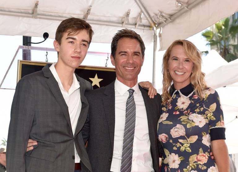 Image of the popular actor Eric McCormack and wife and son