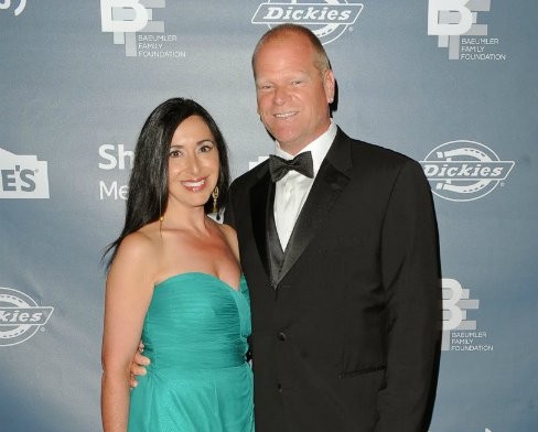 Image of a Canadian businessman and builder, Mike Holmes and girlfriend
