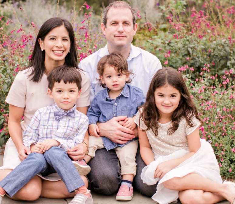 Image of a broadcast journalist., Ylan Mui and her family