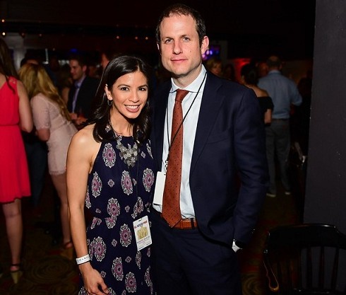 Image of a broadcast journalist., Ylan Mui and her husband
