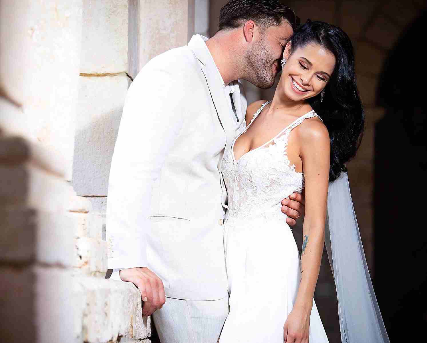 Lilianet Solares in wedding dress with her husband Chris