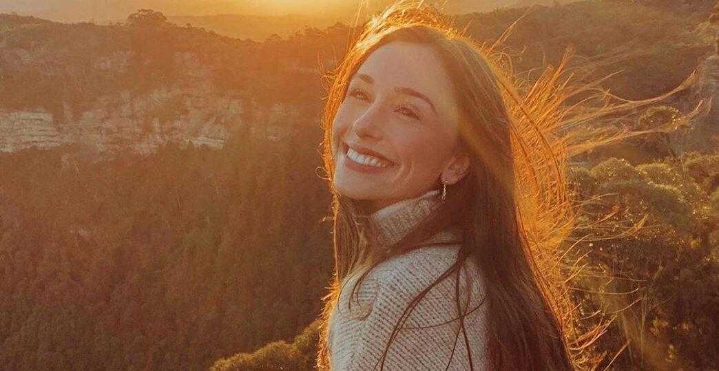 Beautiful Kristina Alice smiling in light rays