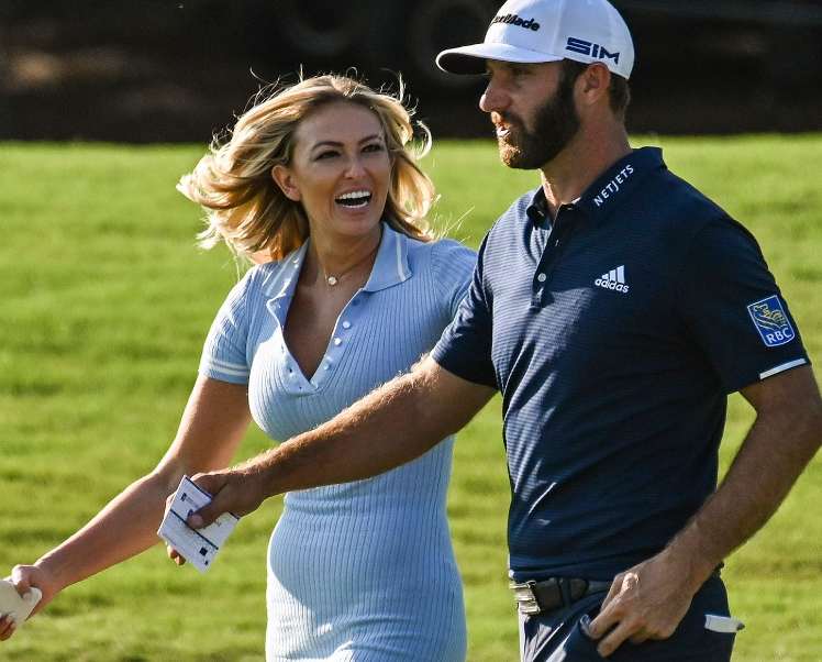 Paulina Gretzky smiling with her husband dustin