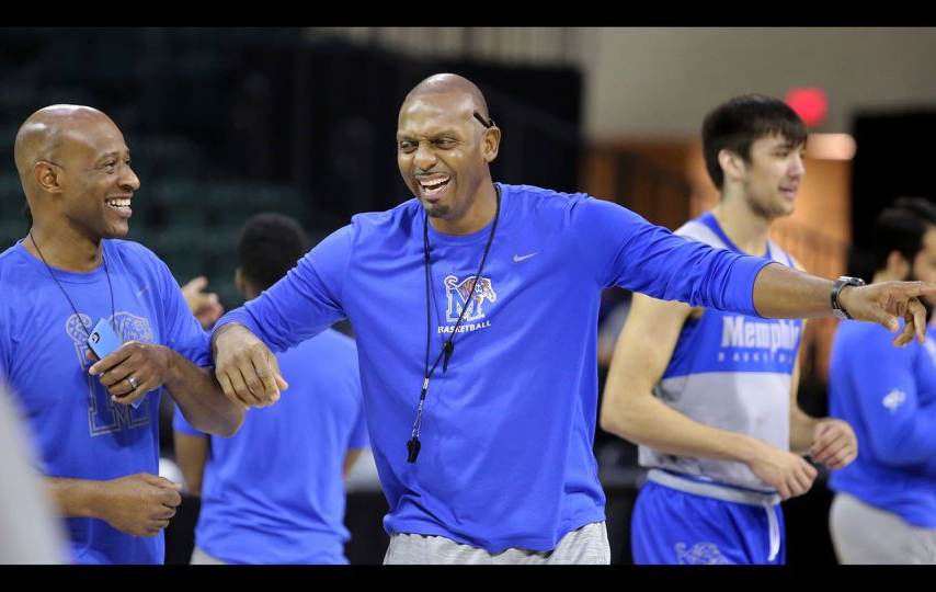 Penny Hardaway smiling in playground with others