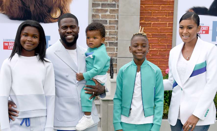 Eniko Parris looking happy with her husband, Kevin and kids