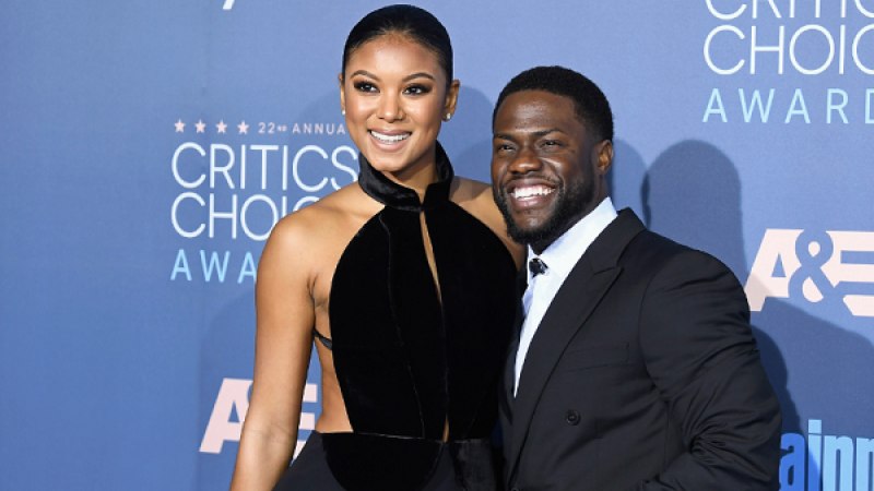 Eniko Parrish is black outfit with her husband, Kevin Hart
