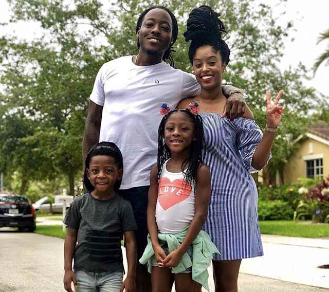 Ace Hood with his wife and children